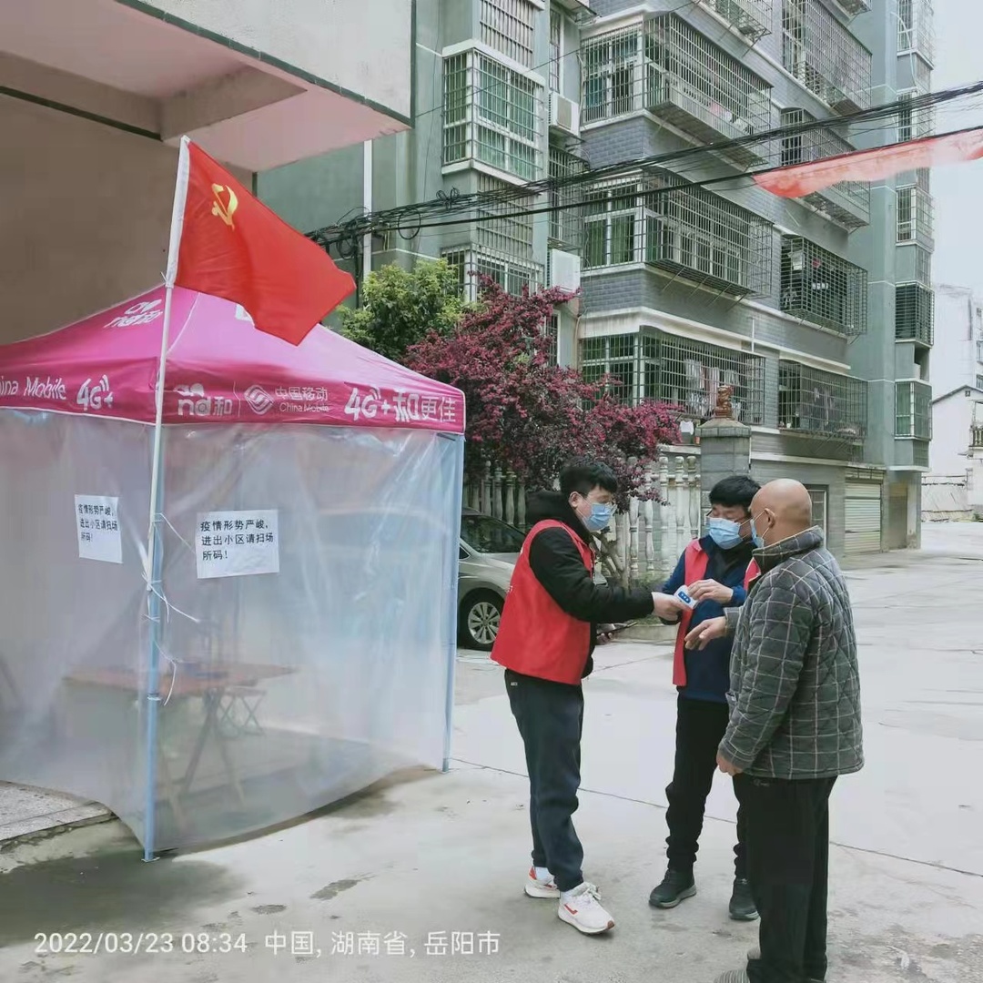 归义镇：党旗飘飘 担当擦亮防疫底色