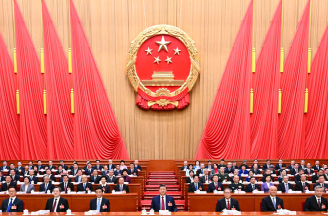 十四届全国人大四次会议在京开幕 习近平等在主席台就座