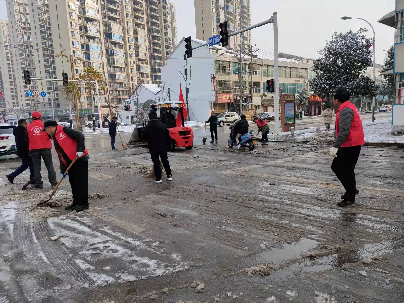 汨罗镇：映雪党徽别样红，志愿服务暖人心